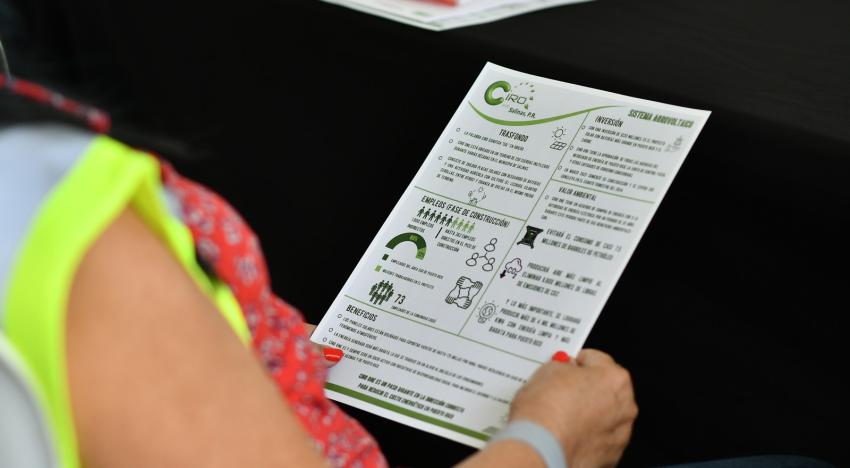 Person holding a piece of paper